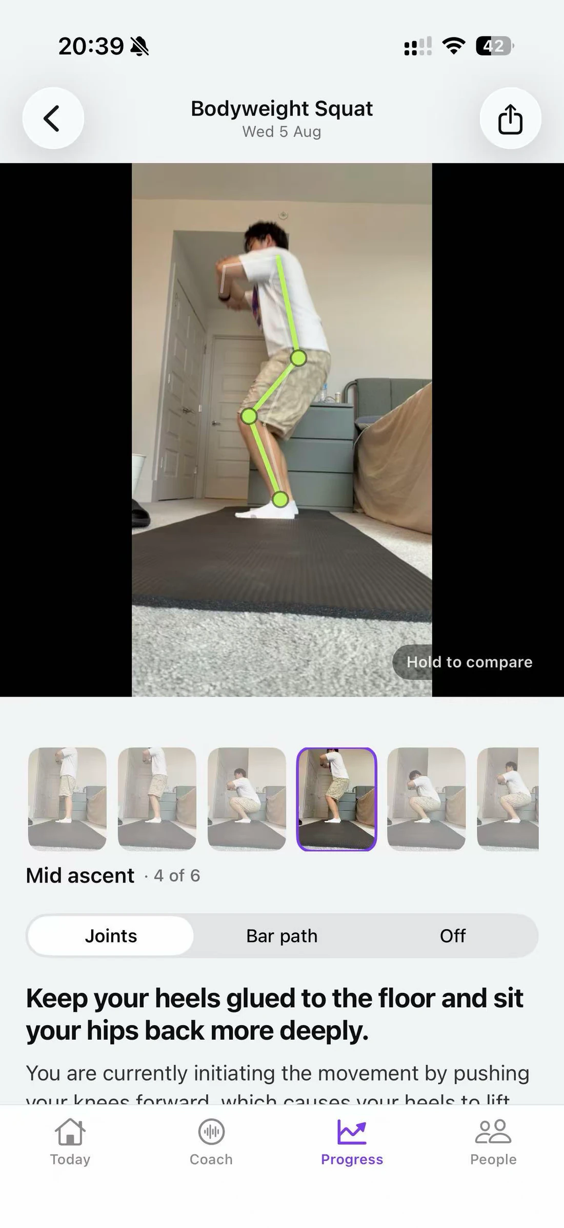 ZYM form check — a bodyweight squat with a joint overlay for frame-by-frame review